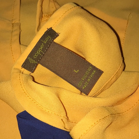 Bright Orange Tank Top with Blue Bows on the back. - Picture 3 of 3